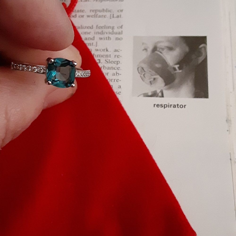 Bright blue topaz with diamonds